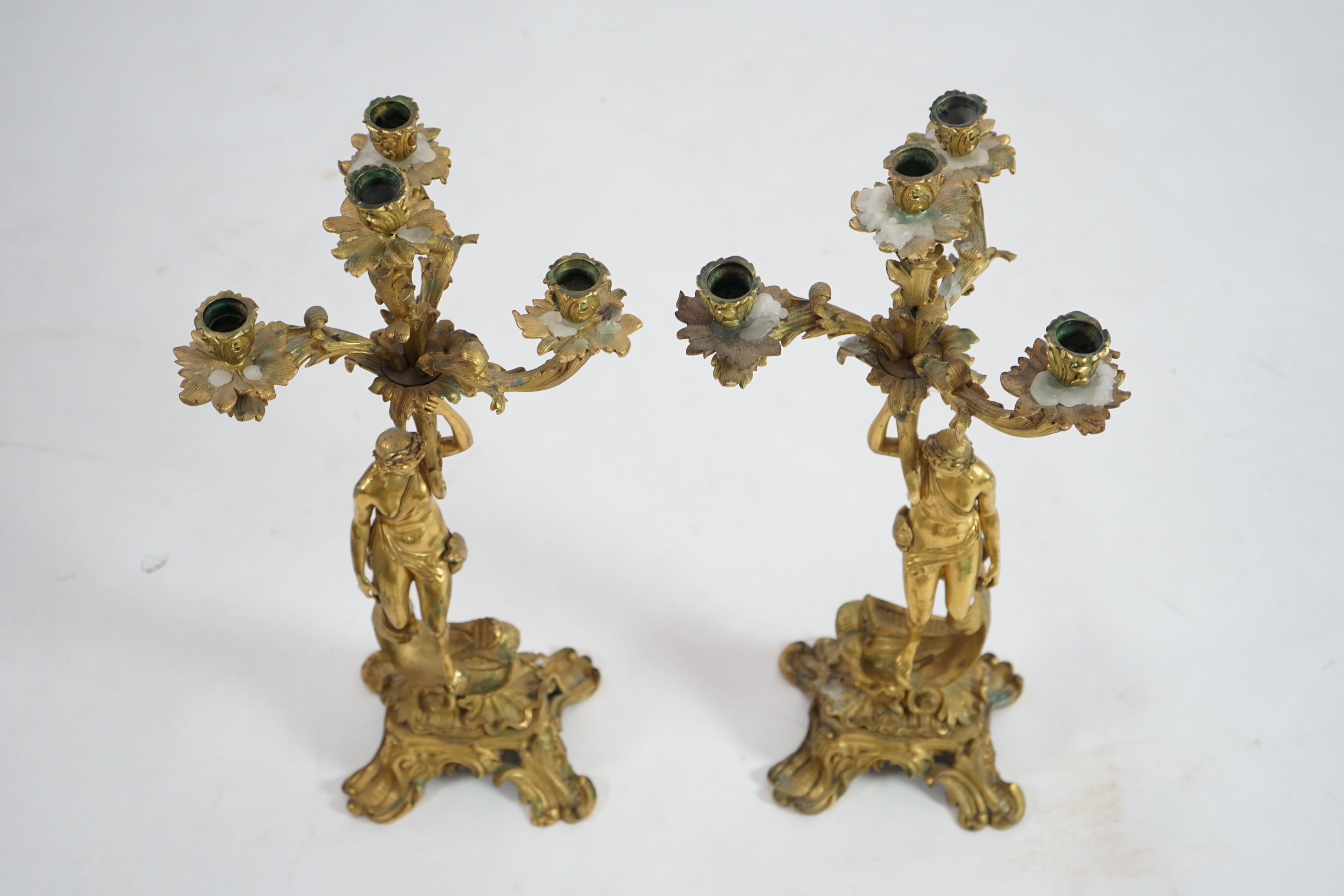 A pair of 19th century French ormolu five light ‘Venus’ figural candelabra